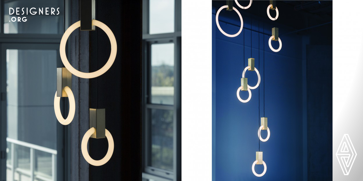 Originally inspired as a graphically interpretation of effervescence. Halo is series of bold lamps inspired by the soft warm glow their illuminaire. This modular system allow the pendants to be suspended in a multitude of compositions as a range of elegant hanging art pieces. Machined and hand finished, they are available brass, copper, nickel and 24 karat gold.