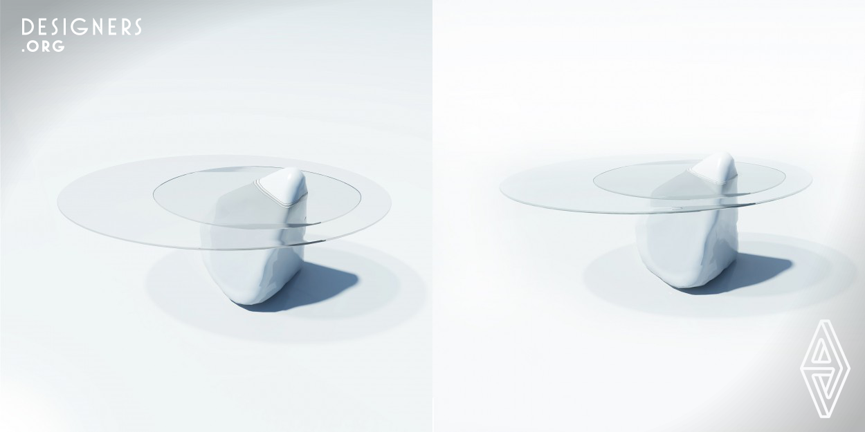 The Iceberg table is designed to attract awareness about global warming and its effect on water level and melting icebergs in north and south poles, the glass panel have the ability to rotate around axis to maximize serving function. The lower glass panel represents the water level in the past, the upper panel represents the water level after melting icebergs. The table is made of 2 oval panels of clear glass and iceberg shaped white acrylic made by CNC machines. 