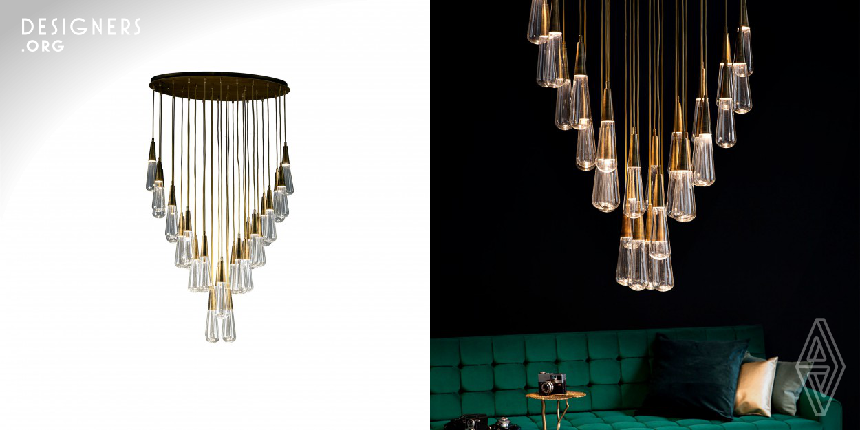 Artizen is not only a chandelier, it is also an expression of pure human feelings expressed through an art. It is like an sculptural design which is also be lighting for spaces. Masculin materials such as glass and brass are sculpted into an organic form by hand. 