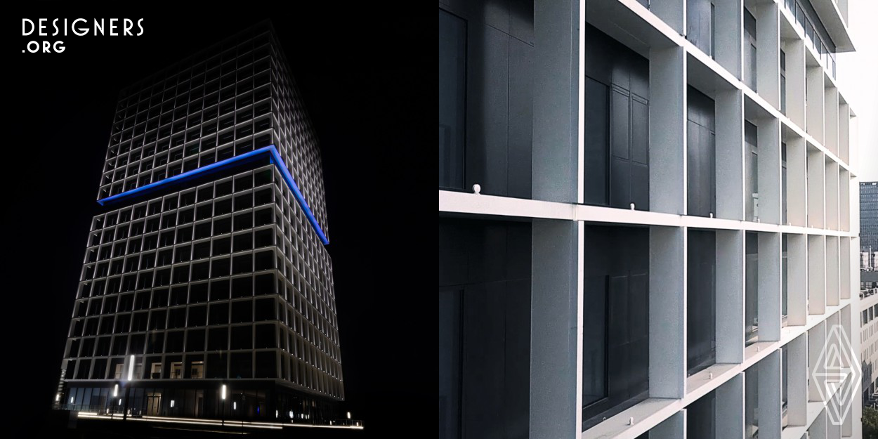The concept of One Cube – One Reflection was the source of inspiration in façade lighting of a 20-floor commercial office tower in CaoHeJing, Shanghai. With the use of specialized, 360 degree LED projectors strategically mounted at the base of each bay, the lighting design team produced a glowing lit latticework of squares, making the building’s aluminum facade appear as if it has been lit from within. A blue-lit band, positioned on the 10th floor, halves the design into 2, enhancing the concept of reflection, as the lighting effects at the top part of the building mirrors that of the bottom.
