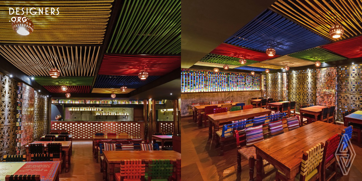 Located on a roof top in a commercial premises, Rangla Punjab is a North Indian regional cuisine restaurant. One can get the feel of rural Punjab while you dine and enjoy North indian Punjabi Cuisine. Using sustainable and local materials was the key factor while designing this regional Indian cuisine restaurant. Rangla in Indian language means colourful. Inspiration for the decor comes directly from the rural areas of Punjab state of India. Rural Indian people love colours and that can be seen on their attire, clothes, accessories they use or even the decorations they do. Here is an attempt t