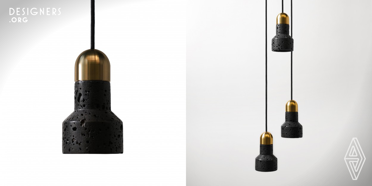A simple and clear integrated design of pendant light made from concrete. One version of the Qie pendant light uses a metallic end, makes the contradiction of colors and textures between volcanic rock and metallic surface is fascinating. Insulating concrete makes it safe from occurrence of electric shock and the concrete itself is so durable that you might not have to get a new one at anytime.