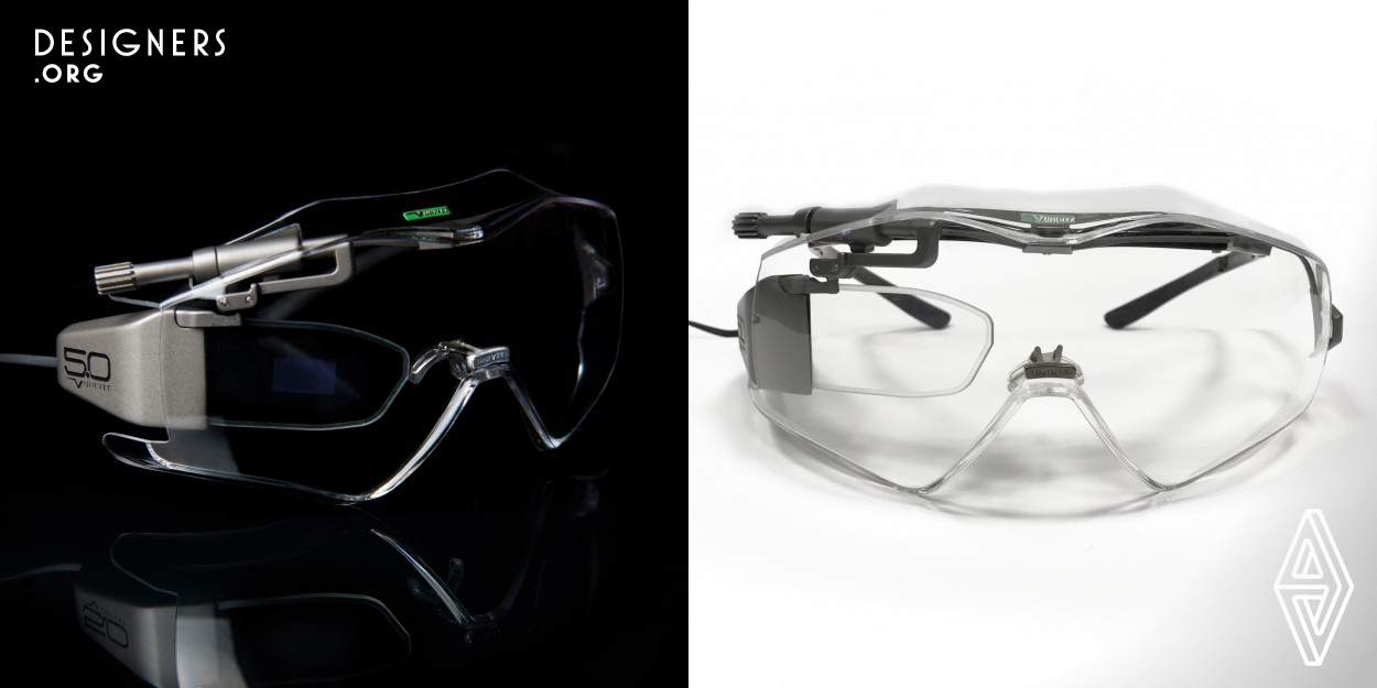 A specifically designed pair of safety glasses, equipped with the holographic wave-guide technology for the most comprehensive augmented reality experience dedicated to the industrial and professional use. A safety eye-wear designed to comply with EN 166 and ANSI safety standards, Over-Spec in order to accommodate operator’s existing prescription glasses, provides a monocular projection system with a 3D adjustable position to fit several papillary distance and different application needs.