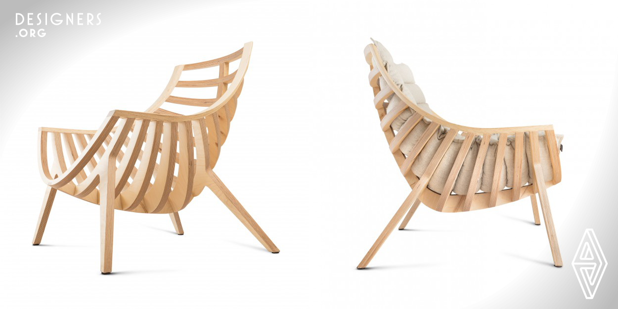 The Lusitana chair is the result of a work on plywood, which goes through the new technologies to a meticulous workmanship that gives it a different image and style, where its form expresses an immediate reading, permits to visualize its details, evoking in the imagination shipbuilding, boats and the sea. Its wooden structure fits constructively with simplicity in a single body, distilling elegance from its smooth curves that are organised in an ergonomic way to provide comfort, supported by the fabric upholstery only placed on the structure that can be changed in divers colors.