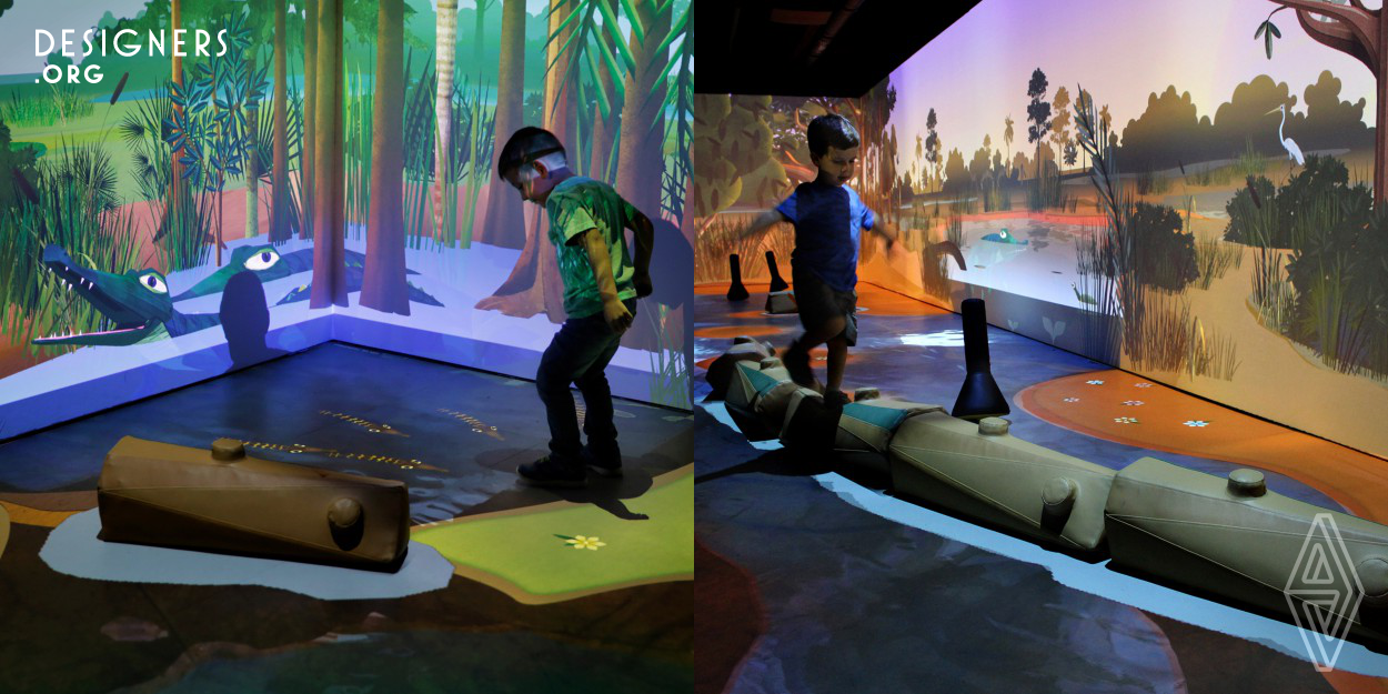 The River of Grass is a large room stuffed from floor to ceiling with tech to give kids and parents the experience of a fully animated interactive day in the Everglades, Florida’s precious wetland area. Using 16 HD projectors, directional audio and 7 networked motion tracking sensors, visitors become part of a life-sized immersive exhibit as they move and play with a host of different animals. Targeted at preschool children, visitors can chase the otter, swat mosquitos, and dam up rivers with artificial logs. When night falls they search for the elusive Florida panther using virtual torches.