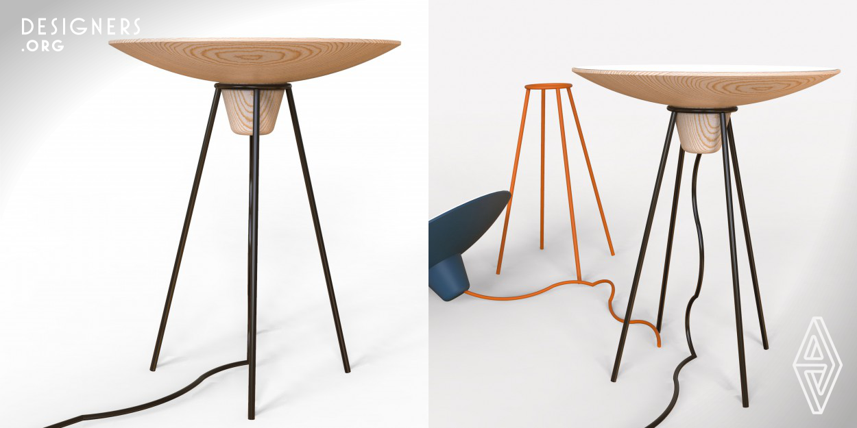 A table , a lamp, a piece to decoration. This piece is singular and trendy, inspired by the flexible use of space, and the interaction of the user with the furniture, also through the possibilities of uses and provisions. The contraposition of materials and forms are one of the highlights of this design. The top of the table turned in pine wood rests on a lightweight slim metal base , giving lightness and beauty to the piece.