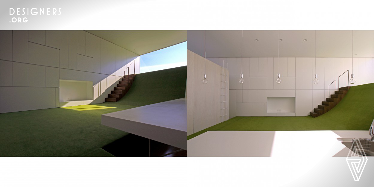 It is the house that allows residents to search for their own whereabouts, which match their emotions, rather than setting the whereabouts in ordinary houses that are predetermined by furniture. Floors of different heights are installed in long tunnel-shaped spaces in the north and south and connected in several ways, have realized a rich interior space. As a result, it will generate various atmospheric changes. This innovative design is worthy of being highly appreciated by respecting that they reconsider the comfort at home while presenting new problems to conventional living.