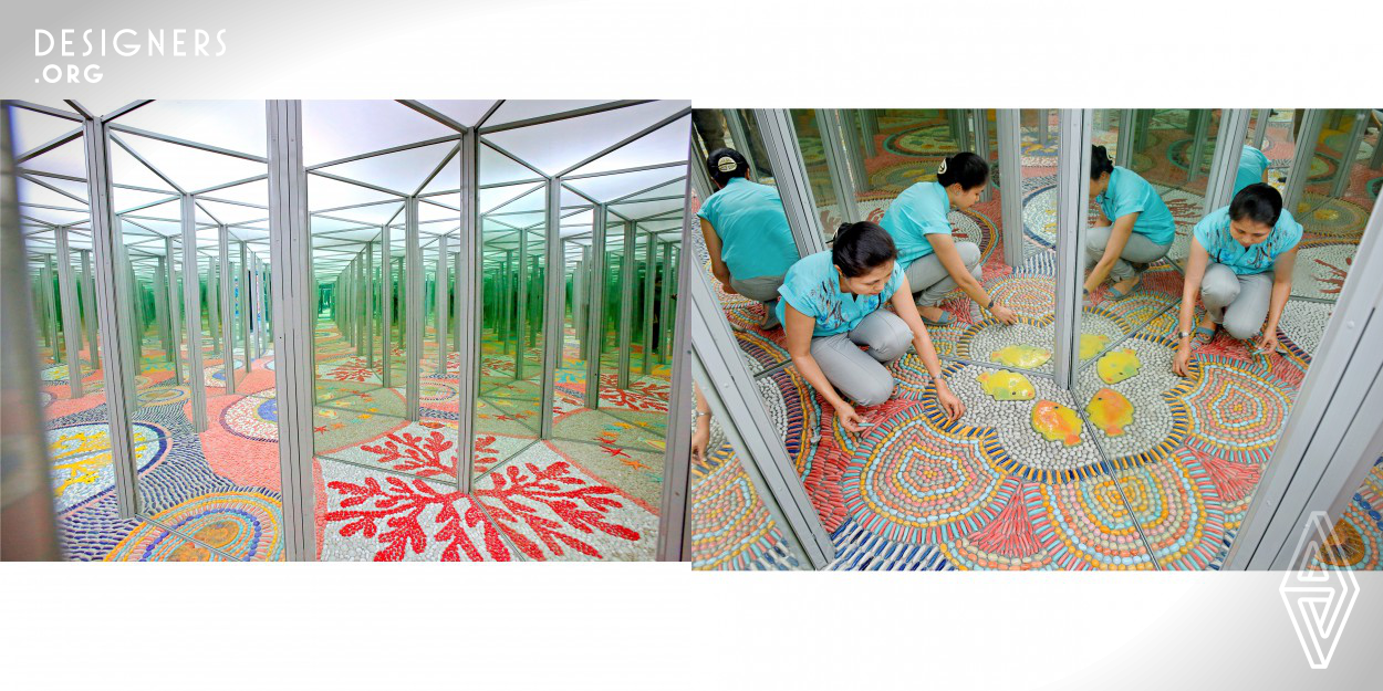 Upon entering the Mirror House in Hanoi’s Reunion Park, visitors are swept into the depths of the ocean as they explore the wonders and beauty of the sea. Brilliant colored ceramic mosaic murals feature snails, starfish, sea anemones and a wide array of tropical fish. Mirrors add a sense of magic and intrigue. This experience was captured by painter Nguyen Thu Thuy and her colleagues in a 3D artistic expression. Being able to develop a deep appreciation for public art is rare in Vietnam, but Thu Thuy is breaking the barriers.