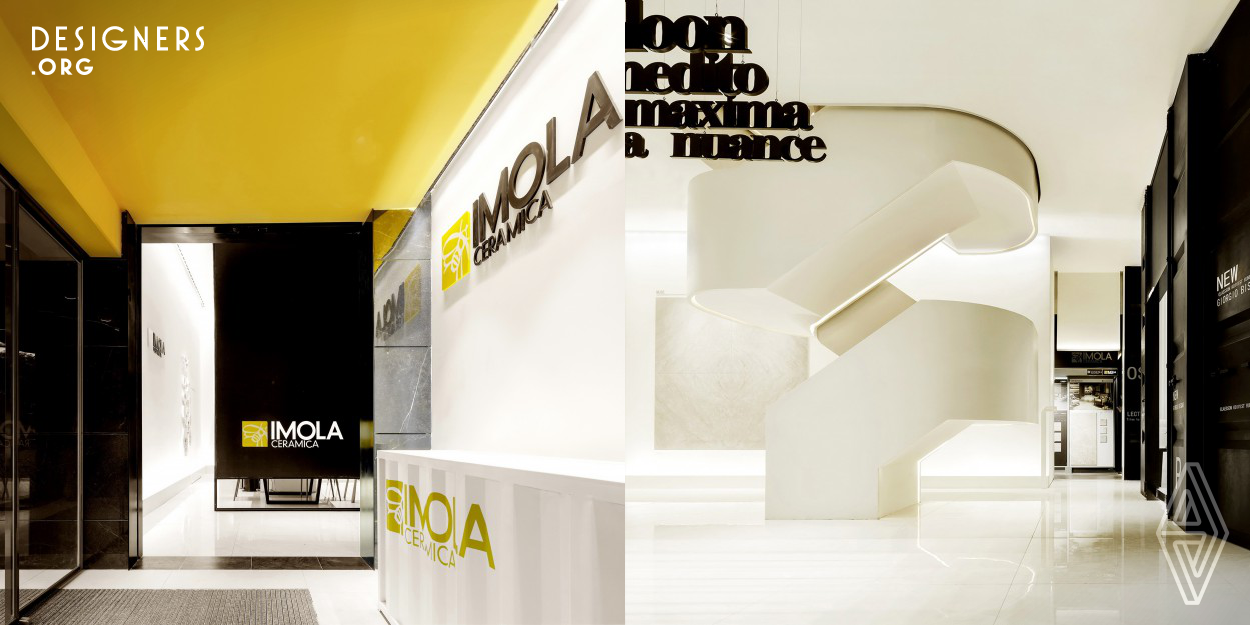 Basing on the brand culture, the designer uses the contrasting colors yellow, black and white to create the existence of the space. After studying the relationship between the sales process and the circulation in the space, the designer makes the container window on the first floor showing Imola's life aesthetics. In the middle of the space, the bold white stairs decorated with the lighting on the bottom outlining the structure by which people walk to the negotiation area upstairs. The blank-leaving in Chinese painting and the customized font in the space show the simple and exquisite life style.