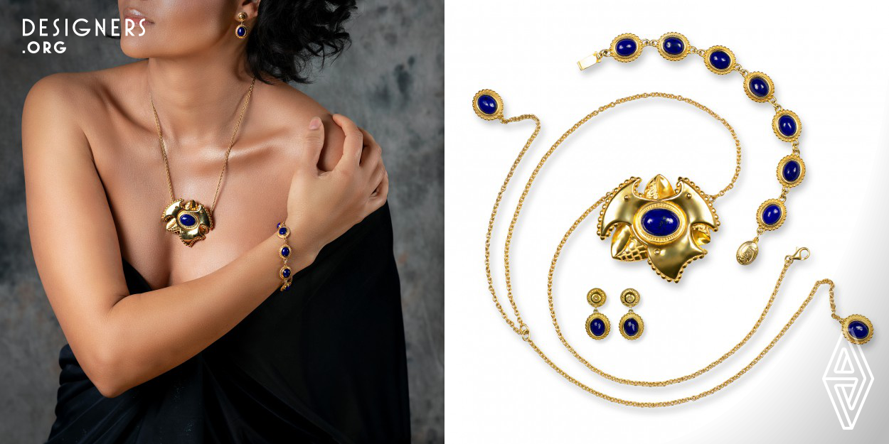 The Merging Galaxies jewelry collection by Olga Yatskaer is based on three main elements, two of which are made in two different sizes, representing galaxies, planet systems, and planets. The pieces exist in gold/lapis lazuli, gold/jade, silver/onyx and silver/lapis lazuli. Every element has a network-shaped design on the backside, which represents gravitation forces. In this way, the pieces continuously transform themselves while worn, as elements turn. Moreover, optical illusions are created through fine engravements, as if small gemstones were set.