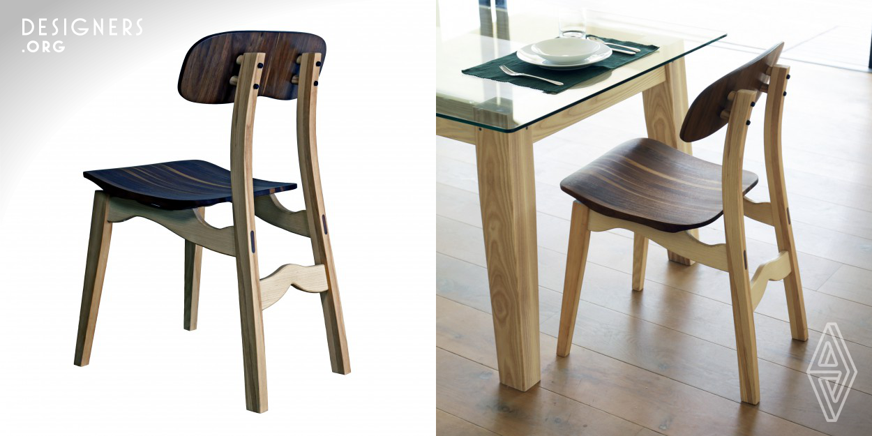 Beke means 'peace' and 'to be connected to'. The Beke dining chair design supports an ergonomic and aesthetic sense of peace, and at the same time a sense of connection with the space at the table. The design respects the simplicity of the Danish Modern philosophy, and yet incorporates a shaped solid hardwood seat and back; integrates South African Cape Dutch architectural motifs with a sweeping architectural profile; and uses a clean ash frame to showcase the richness of local and international hardwoods.