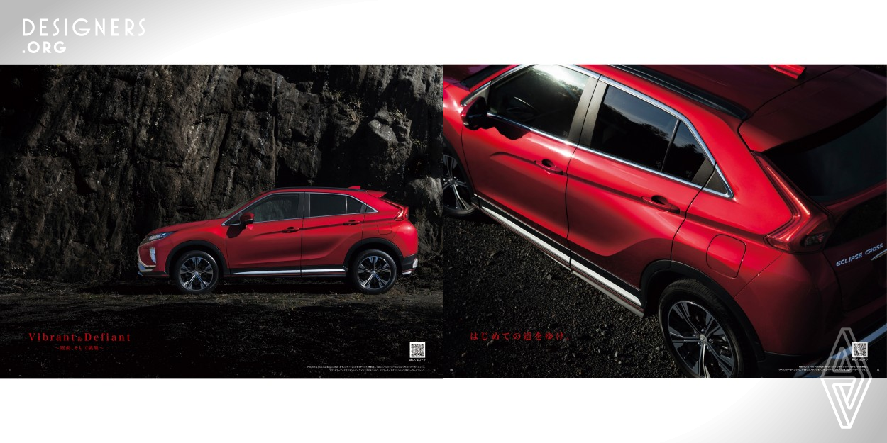 Mitsubishi Motors changed its brand tagline from drive@earth to Drive your Ambition and unveiled a new model Eclipse Cross as the first release under this new tagline. The Eclipse Cross is a SUV featuring aggressive design symbolizing the tagline. A twist offering people a real experience of Eclipse Cross’ dynamism and presence through a visual perception is added to this brochure. We used a photographer whose area of expertise is to shoot motorsports and pursued reality with one shot. In addition, a QR code offers people a chance to watch short movies showing its strength.