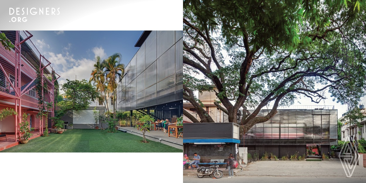 The Courtyard is located on a busy street in central Bangalore. It is a community space that enables various workshops and showcase for local brands, art performances and social gatherings. It also has a café and acts as a dedicated space for people to associate with diverse art forms. The entire space is an amalgamation of two buildings that belong to two different eras, separated by a connecting courtyard. This project sees the refurbishing of an existing space and introduction of an additional structure in order to elevate its purpose.