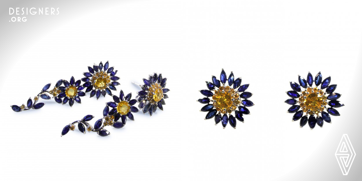 Daisy's are composite flowers with two flowers combined into one, an inner section and an outer petal section. It symbolizes the intertwining of two representing true love or the ultimate bond. The design blends in the uniqueness of the daisy flower allowing the wearer to wear the Blue Daisy in multiple ways. The choice of blue sapphires for the petals are to emphasize inspiration for hope, desire and love. Yellow sapphires chosen for the central flower petal engulfs the wearer to feel a sense of joy and pride giving the wearer complete serenity and confidence in displaying its elegance. 