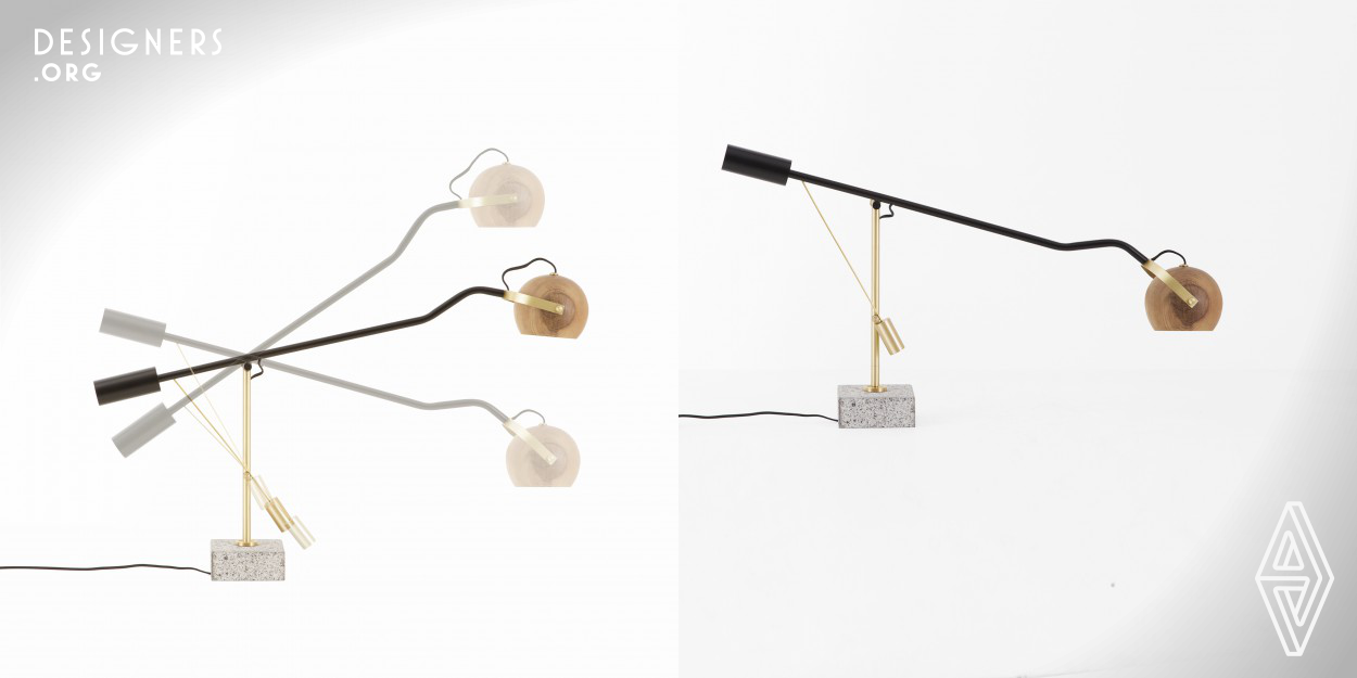 Umbu is a brazilian desk lamp, an adjustable direct lighting. The movement is continuous and soft. It have a triple articulation: the stem turn to both sides and adjusts the degree of inclination. The reflector has a diverse set of movements. The design value natural materials and handcraft. It uses brass, metal, Brazilian solid wood and granite stone. The experience is complet, touching the solid wood reflector is smooth. 