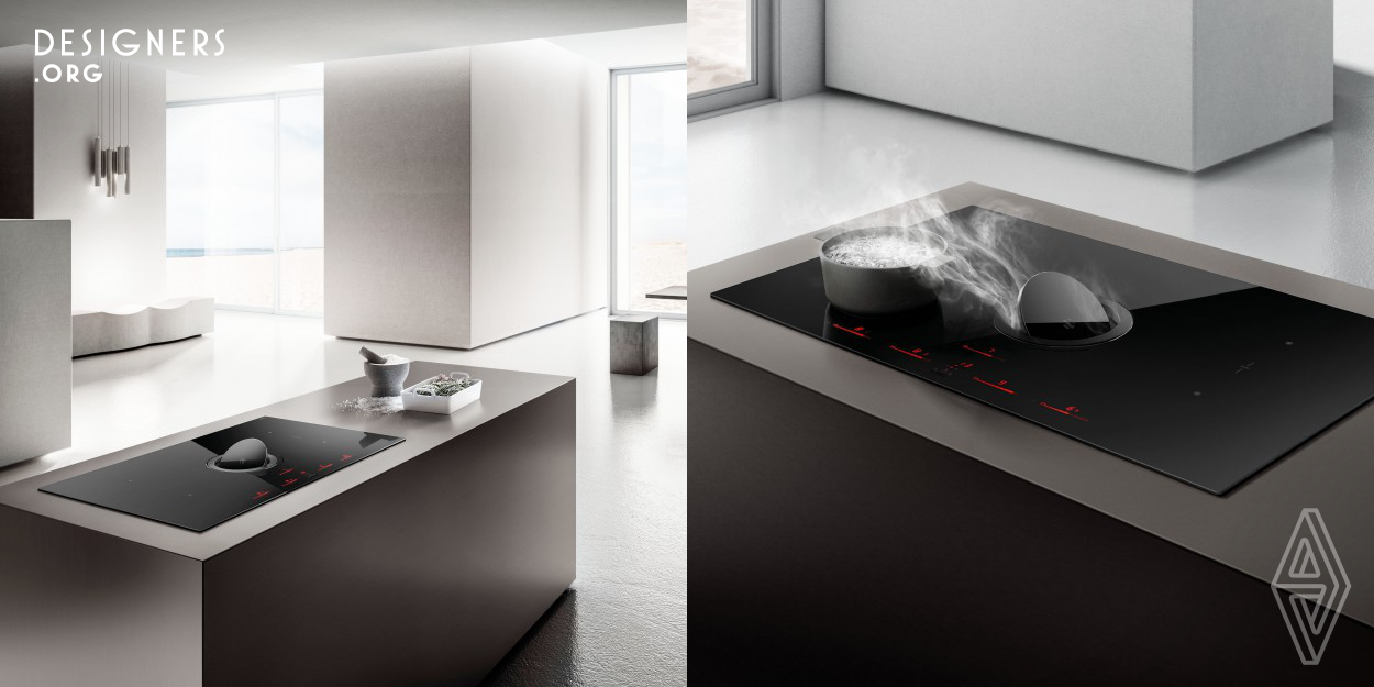 NikolaTesla Switch is the latest induction cook-top with an integrated extraction system by Elica created to revolutionize the daily cooking experience and turn the point of view of the kitchen literally upside-down. Cooking and extraction are combined in a single unit where the search for harmony and maximum attention to detail, together with innovative functions and unique performance, produces the highest expression of technology and design. A central disk of glass and steel, completely flush with the cook top surface, cleverly conceals the extraction system. 