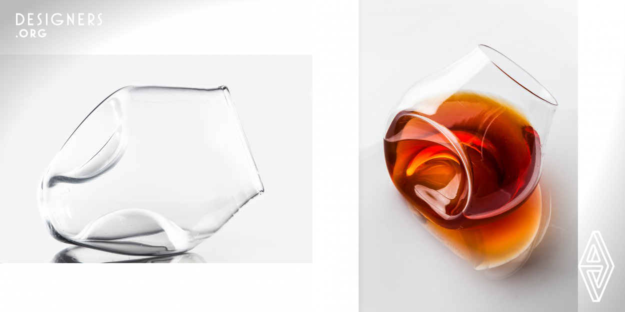 The work was designed for drinking cognac. It is free-blown in a glass studio. This makes every glass piece individual. Glass is easy to grab and looks interesting from all angles. The shape of the glass reflects light from different angles adding extra enjoyment to drinking. Due to the flattened shape of the cup, you can place the glass on the table as you wish resting on either of its sides. The name and idea of the work celebrate the ageing of the artist. The design reflects the nuances of ageing and invokes the tradition of ageing cognac improving in quality.