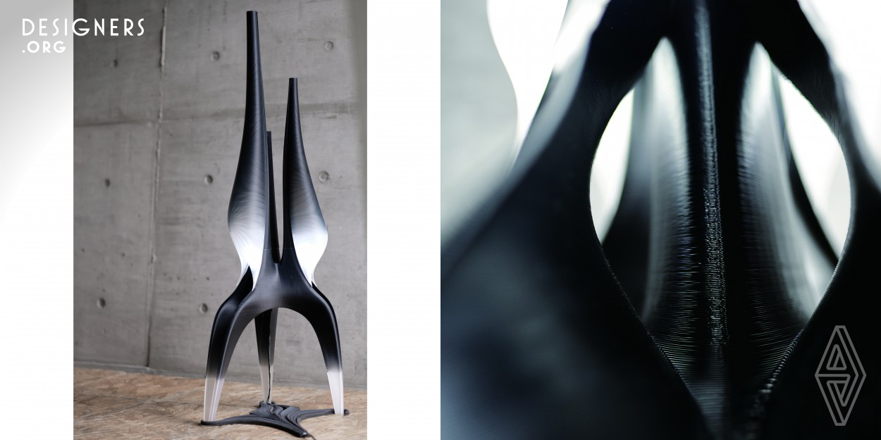 The decorative floor lamp Calla Noir, nearly 130cm tall, was printed on a large-scale delta style printer. With the help of new performance materials from Modex 3D filaments and the 3D printing facilities at Linkin Factory, Calla Noir achieved, what just three years ago, seemed like an insurmountable task in 3D printing. Drawing from extensive experiences gained from the past several years of investigation into the potentials of FDM 3D printing, sKY Associative integrated large-scale printing, color gradient printing, and machine code controlled patterning techniques to develop Calla Noir. 
