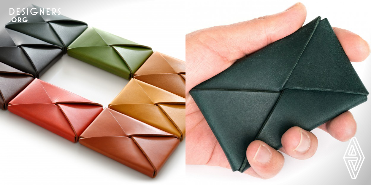 "Tsutsumu" was brought to life based on the Japanese custom of wrapping items carefully, such as "furoshiki (a piece of cloth used to wrap objects)" and "noshibukuro (a envelope used for gifts of money)". It is made by folding a piece of high-quality leather - beautifully, like origami - without using a piece of fastening material.Tsutsumu is designed to gently wrap users' important business cards. It is a palm-size masterpiece that looks stylish in business situations while also expressing users' elegance.