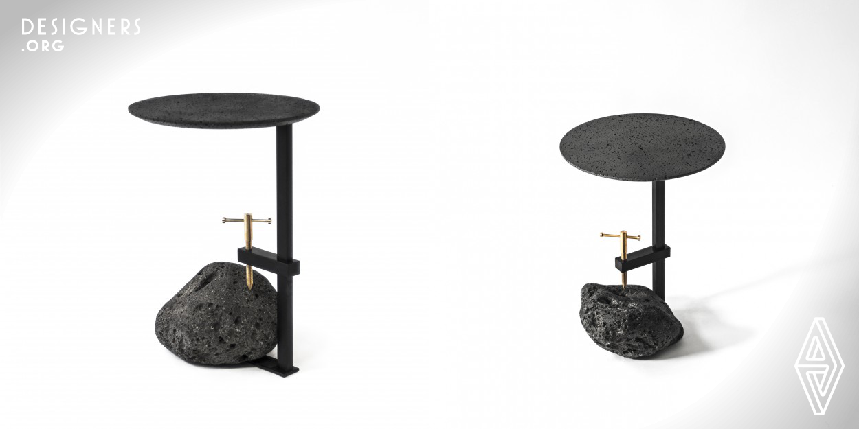 The F, a paradoxically lava stone side table, combines the flat and smooth table surface of mechanical production and the base of the natural primordial stone at the bottom. Modern design is about industrialization which means standard or consistent. And yet, F of standard machined form, borrowed from the industrial stool, F clip, has to be weighed with a primitive lava stone from nature, to keep itself firm. It shows the different states of volcano stone on one design, combining mechanical aesthetics with natural beauty.