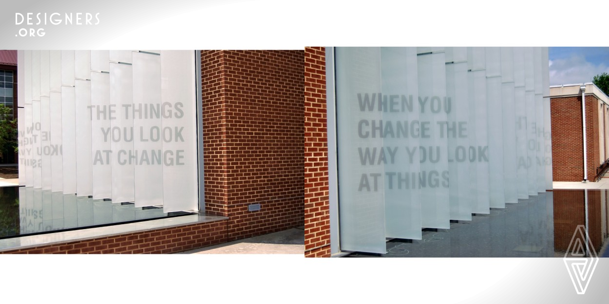 This interactive installation compels the viewer to move in such a way to view the piece differently. As people walk by, the shapes align to form a message, which can be read walking from either direction. Installed on an art building at a university, the piece can be viewed from inside the gallery or across campus and draw people to it. The lighting also reflects the shapes of the typography in the form of shadows and reflections.