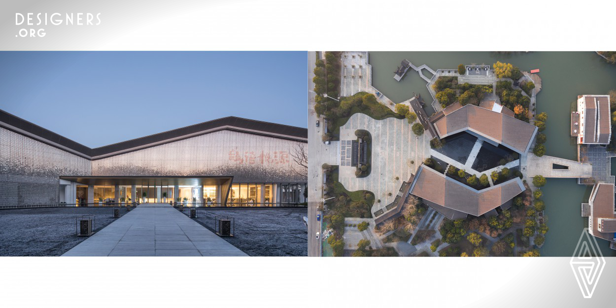 The project is located in Qin Lake Scenic Area, China. Within limited transformation scope and considering sensible cost control, the designers removed the original outer skin of the building and redesigned the facade of the building on the west side with a wind curtain wall. The large-scale canopy does not only meet the requirements of the entrance function, but also completes the wind curtain wall; the east side of the building adopts a perforated aluminum curtain wall to enrich the light and shadow interplay of the building facade.