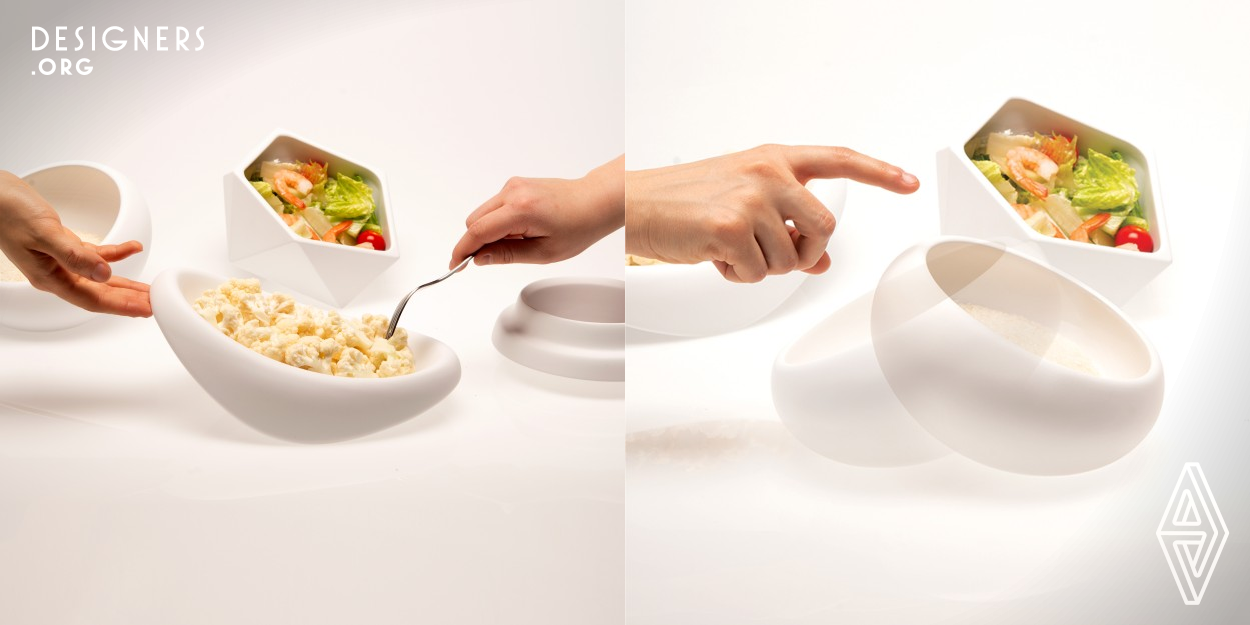 A tableware set that invites and encourages users to share interactions and eat slowly. GravitATE contains three personal dinnerware items and three service bowls. It has the potential for movement and interpersonal interaction. The form invites and encourages users to share these interactions intuitively. The result is that users take their time, sharing conversation and savoring food slower than with traditional tableware. This provides a positive dining experience for all. 