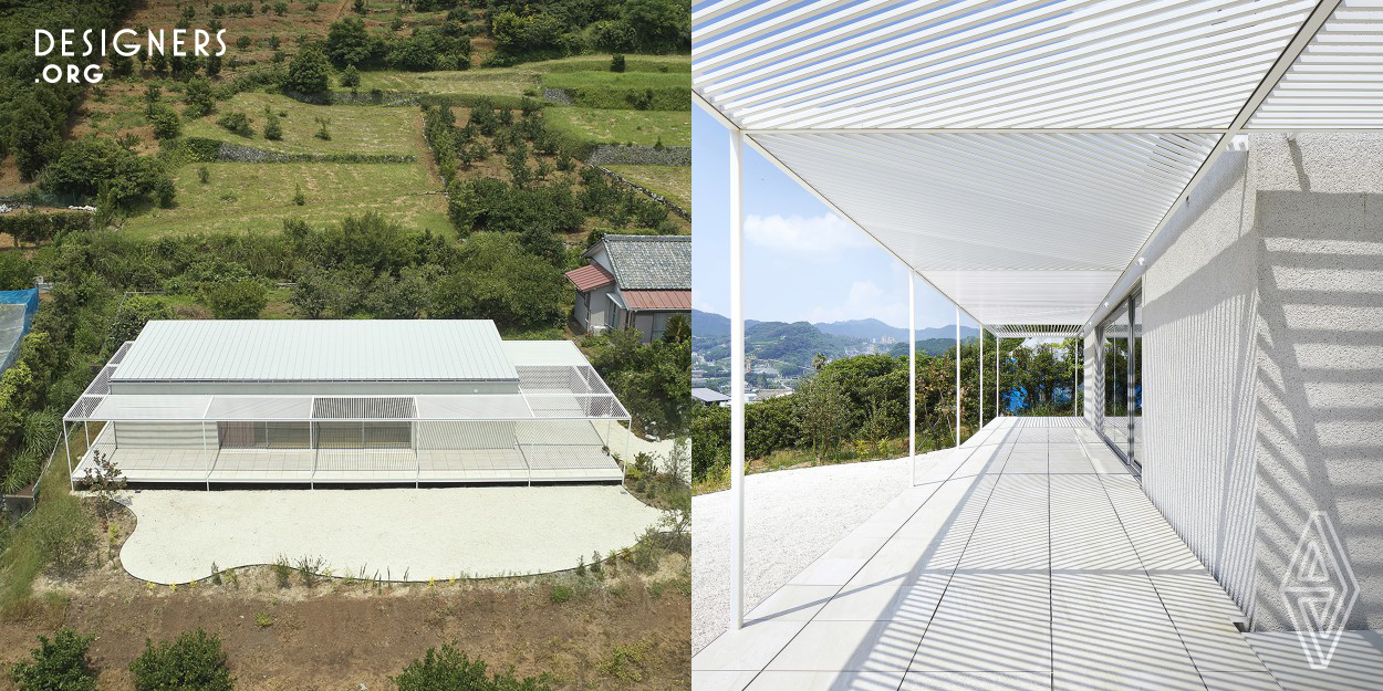 A house is located in north of Hamamatsu city in Japan, and it is surrounded by mandarin plantation on mountain which is feature of the area.Its space are equally divided into two different sections, Indoor and semi-outdoor space, to get the sense of relationship between nature and inhabitation that has been lost in modernism. The pergola is consisted with complex stripe pattern which gives poetic silhouette changed by angle of sunlight to give users sense of time.