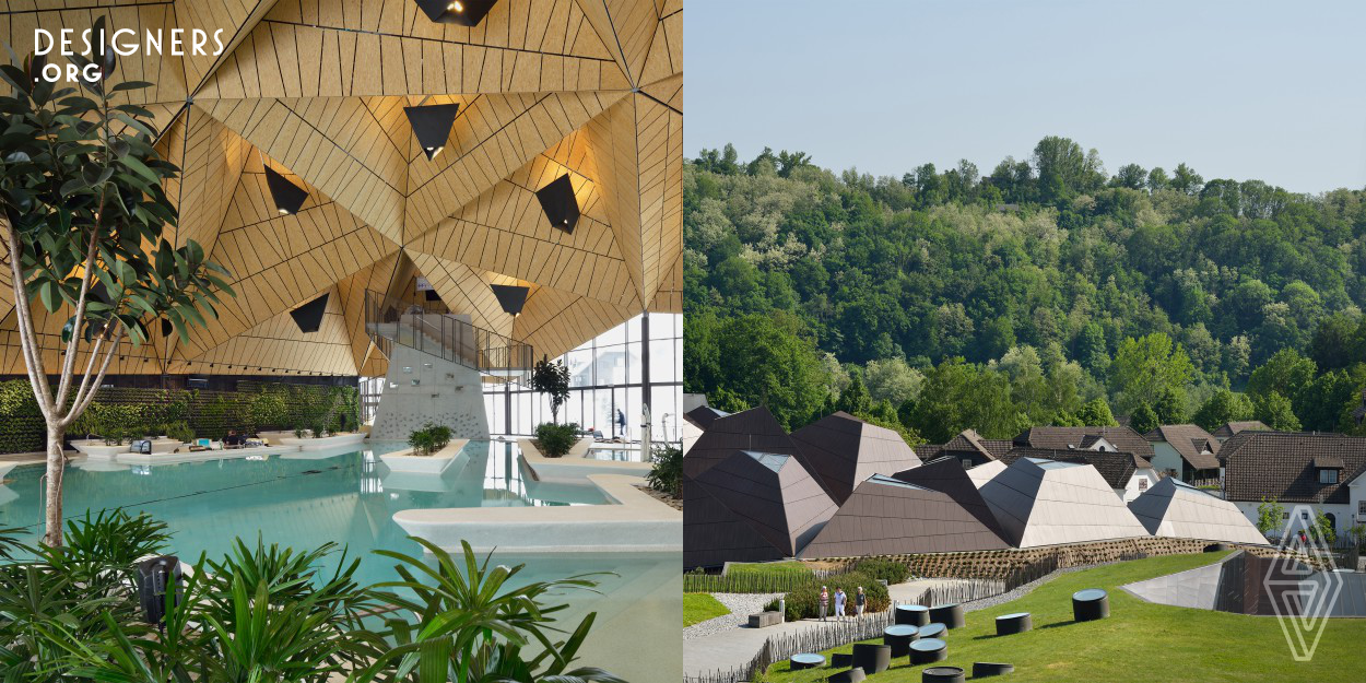 Termalija Family Wellness is the latest in the series of projects which Enota has built at Terme Olimia in the last fifteen years and concludes the complete transformation of the spa complex. Viewed from a distance, the shape, color and scale of new clustered structure of tetrahedral volumes is a continuation of the cluster of the surrounding rural buildings, visually extending into the heart of the complex. The new roof acts as a big summer shade and doesn't usurp any of the precious exterior space.