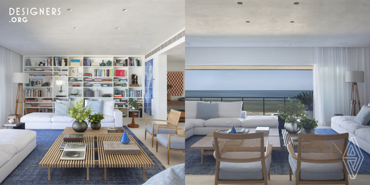 The project is a renovation of an apartment with 600m2 in front of a famous beach in Rio de Janeiro. The challenge of the design was to take advantage of the view and to allow the exterior atmosphere continue inside the apartments spaces. All the colors and materials were chosen to connect this idea. The goal of the architect was to create a Urban Beach House.