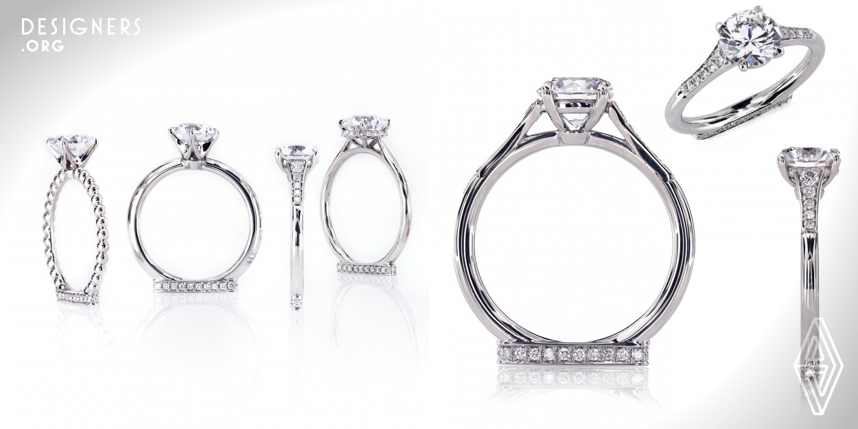 The central concept of the collection is a ring with two faces. One side is a traditional engagement solitaire. The other is a decorative Podium - an aesthetically pleasing element that adds structural strength. Each ring is essentially two rings in one. The hallmarks on the bottom can be replaced with custom engraving carrying a personal message. Each ring can be showcased standing up. When worn, the ring stays balanced, with less spinning. The collection is split into different "labels" easily identifiable by the color of Podium gemstones.
