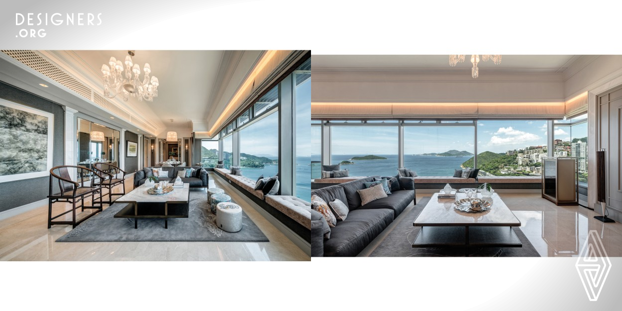 This property is located in Repulse Bay, Hong Kong, which has a tremendous panorama sea view. Floor-to-ceiling windows let abundant lights into the rooms. The living room is comparatively narrow than usual, the designer tries to enlarge the space visually by using a mirror panel as one of the wall features. The designer puts the western element like white marble column, ceiling molding and wall panel with trim throughout the house. Warm grey and white is the main color of the design, which create a neutral environment for mix and match of furniture and lighting.