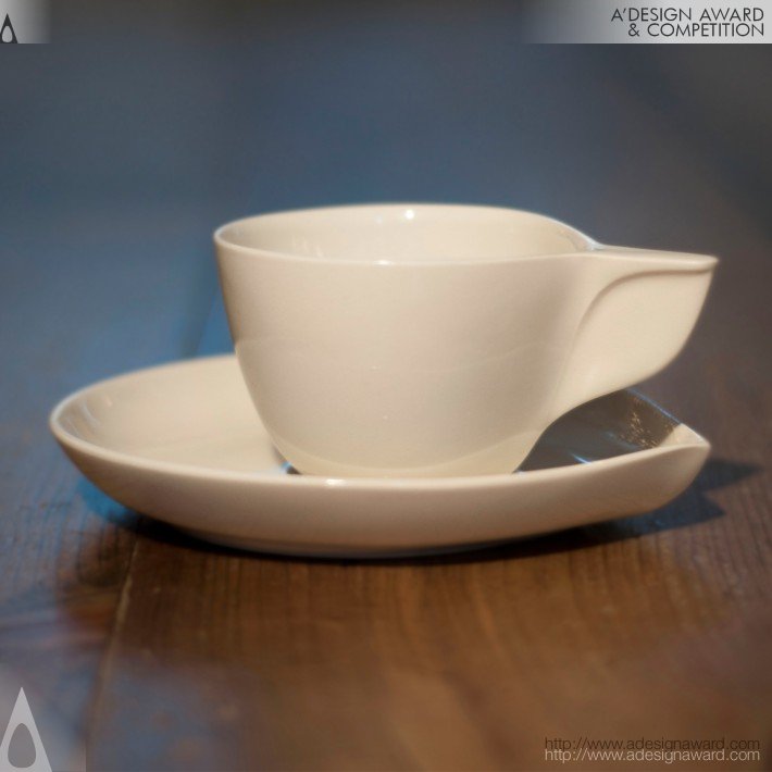 Porcelain Cup and Saucer by Etienne Carignan